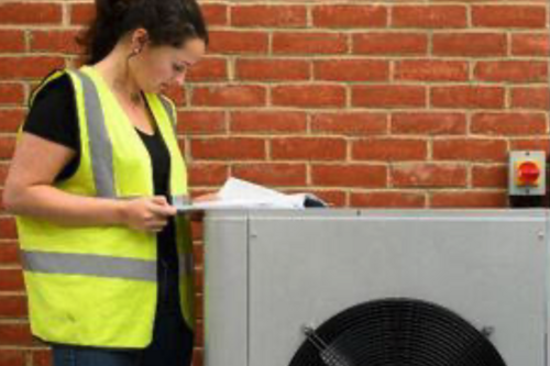 Woman Installing Heat Pump